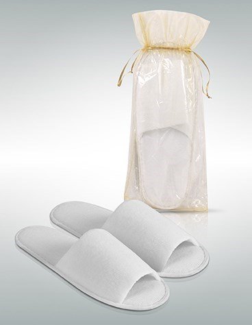 Pantoufles en coton avec semelle antid&eacute;rapante dans un sac en organza (paire).